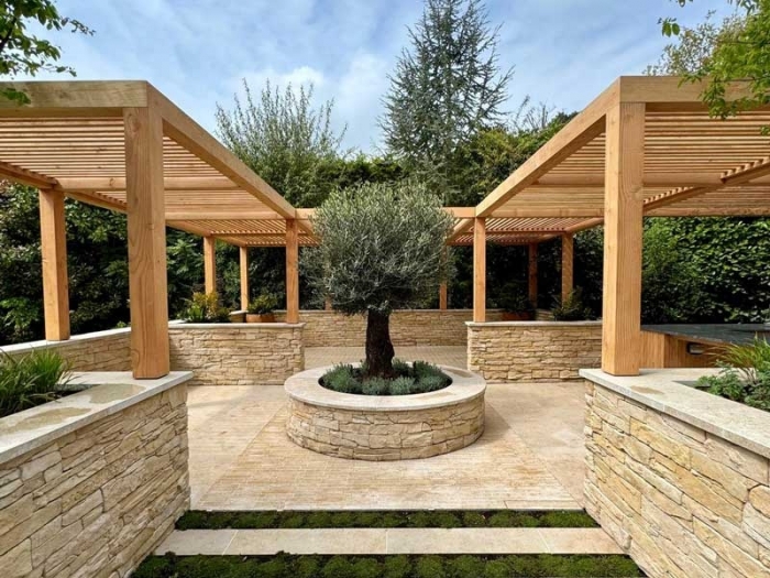 Mediterranean style courtyard garden designed and build by Tom Howard for a client in Surrey